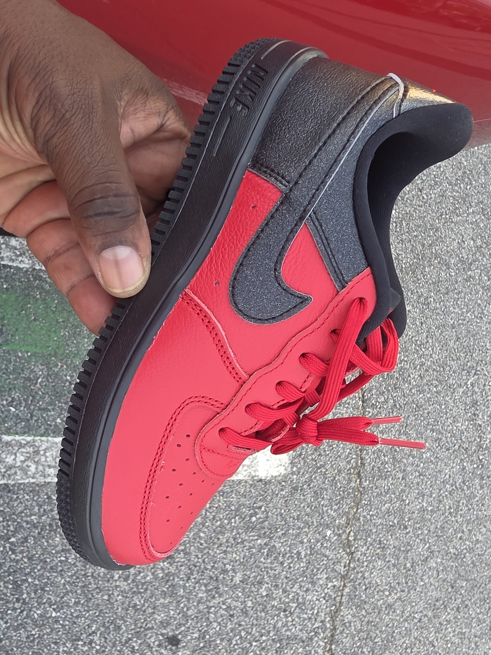 Nike Kids' Low-Top Sneaker in Red and Black